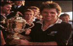 David Kirk holds the trophy for the first time.